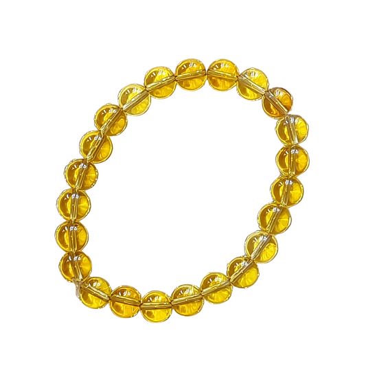 Pulseira de Citrino natural com esferas de 8 mm, tradicionalmente associada à prosperidade, abundância e clareza mental.